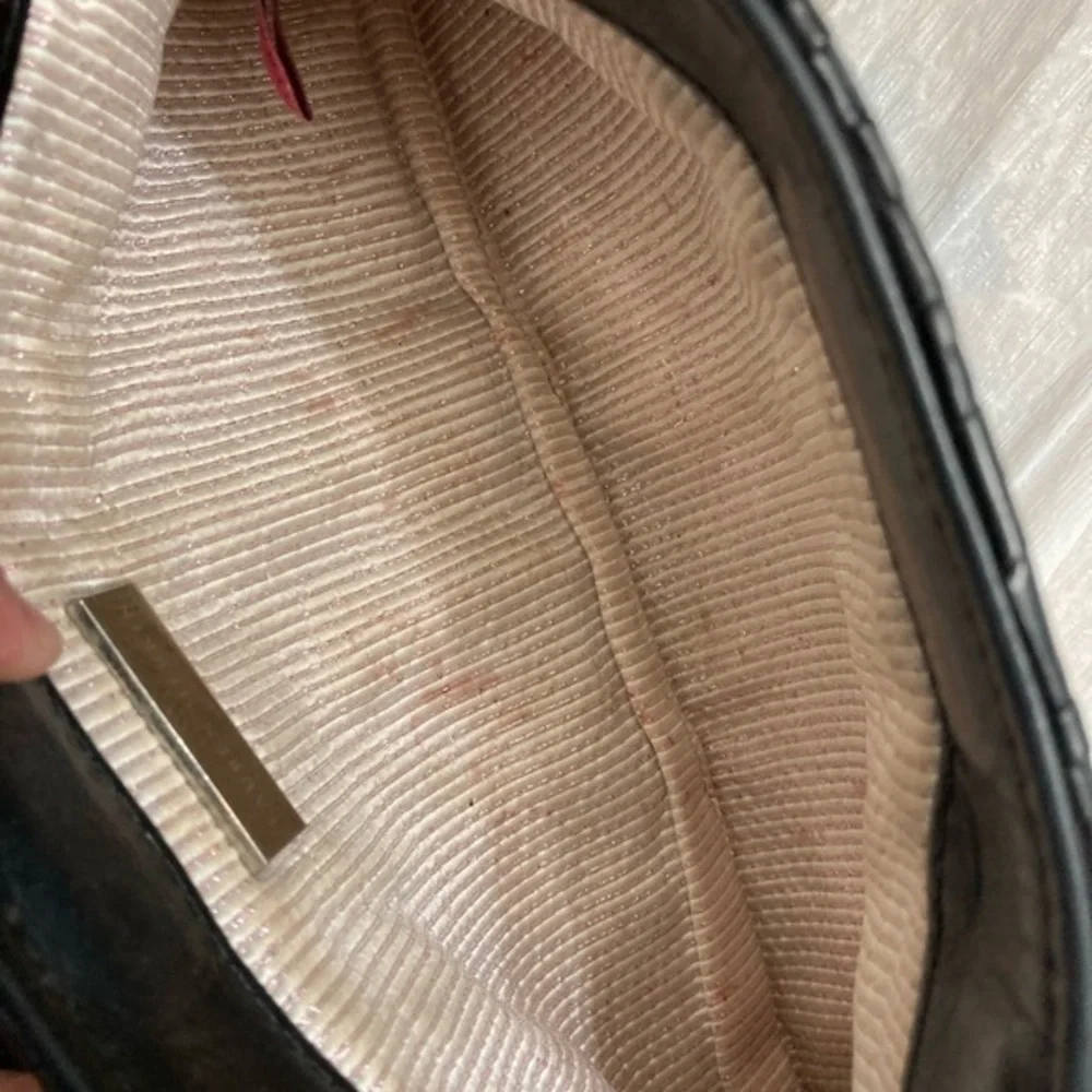 Lauren Merkin light used stains