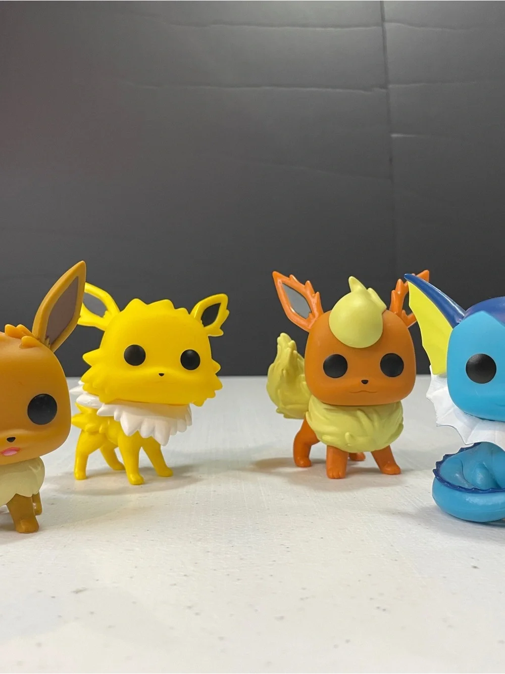 Eevee Evolution Funko-style Vinyl Figure Set (Eevee, Jolteon, Flareon, Vaporeon)