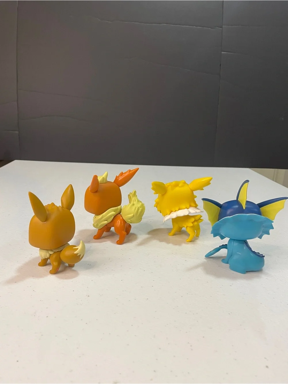 Eevee Evolution Funko-style Vinyl Figure Set (Eevee, Jolteon, Flareon, Vaporeon)