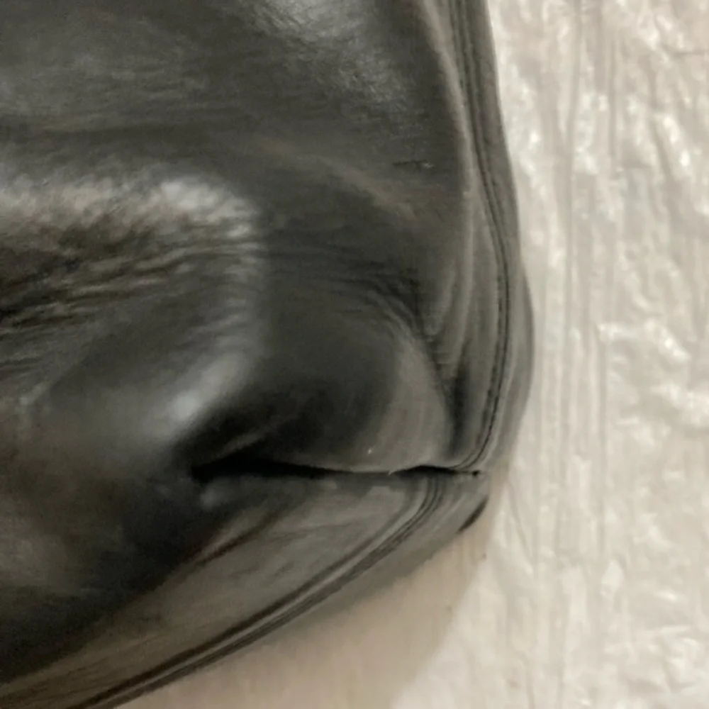 Coach some scuffs