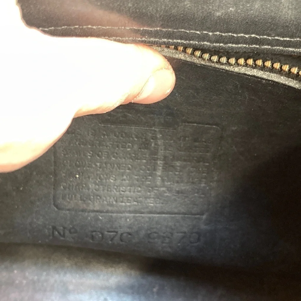 Coach has scuffs
