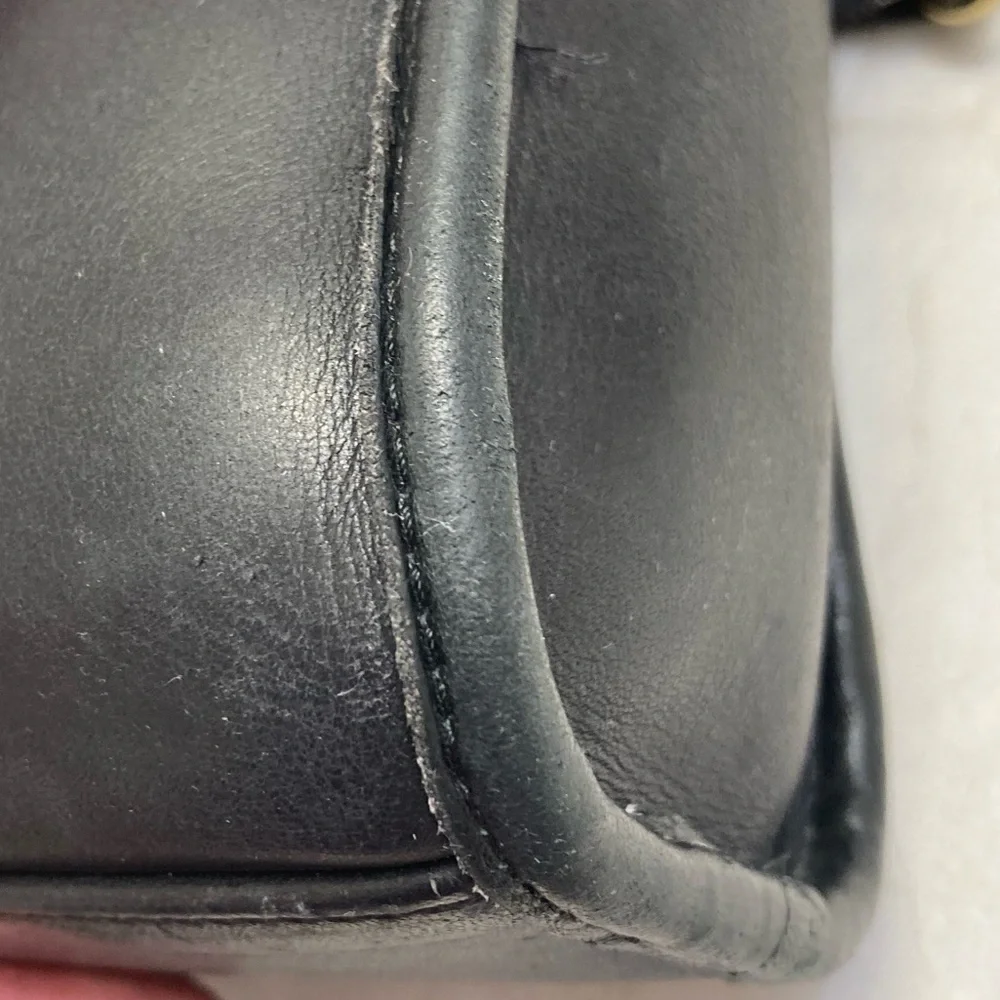 Coach has scuffs