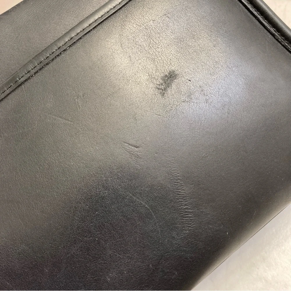 Coach has scuffs
