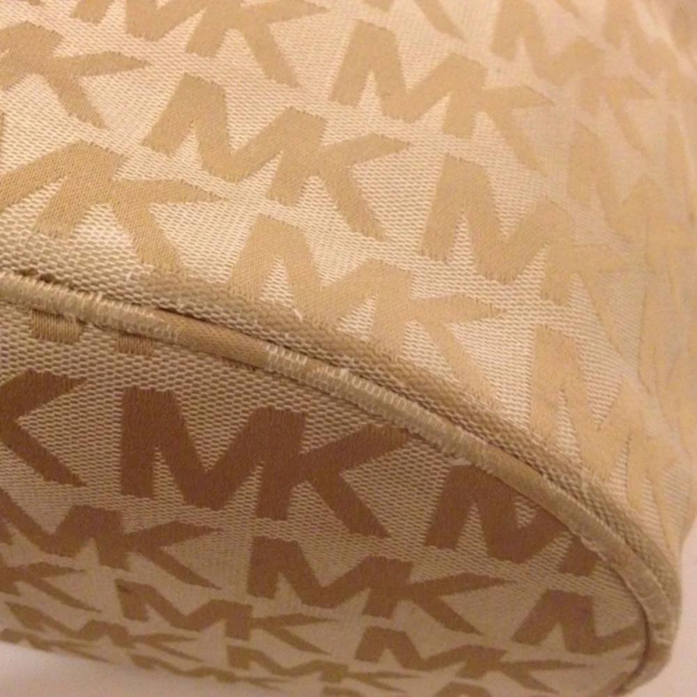 Gold Michael Kors monogram tote