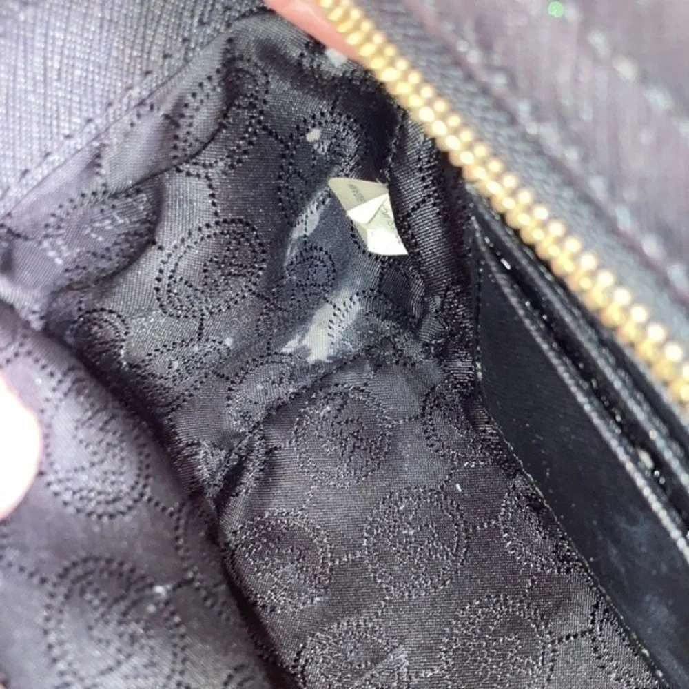 Michael Kors hardware used wear