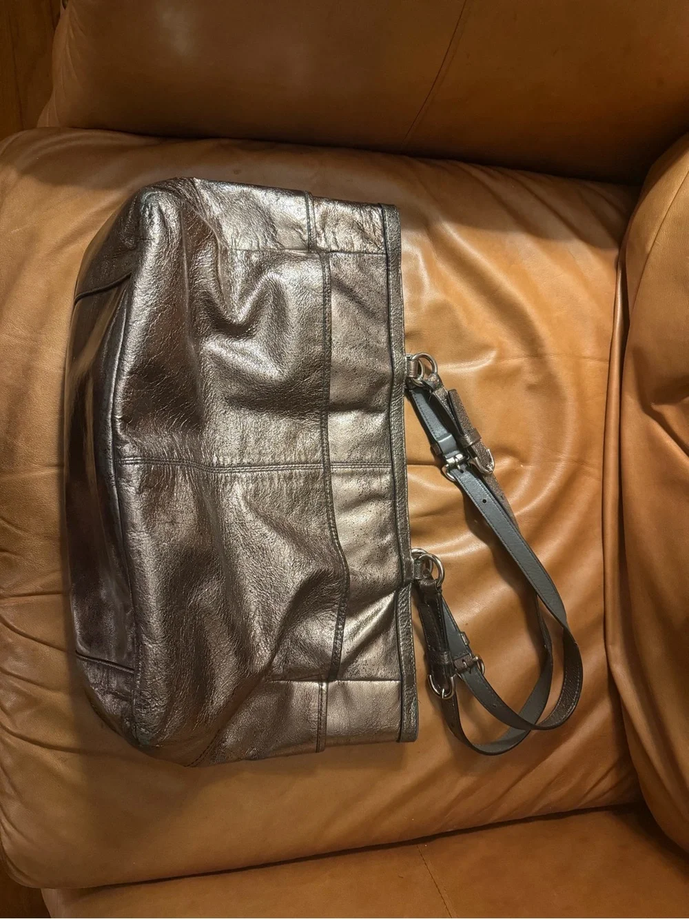 Coach subtle accents metallic