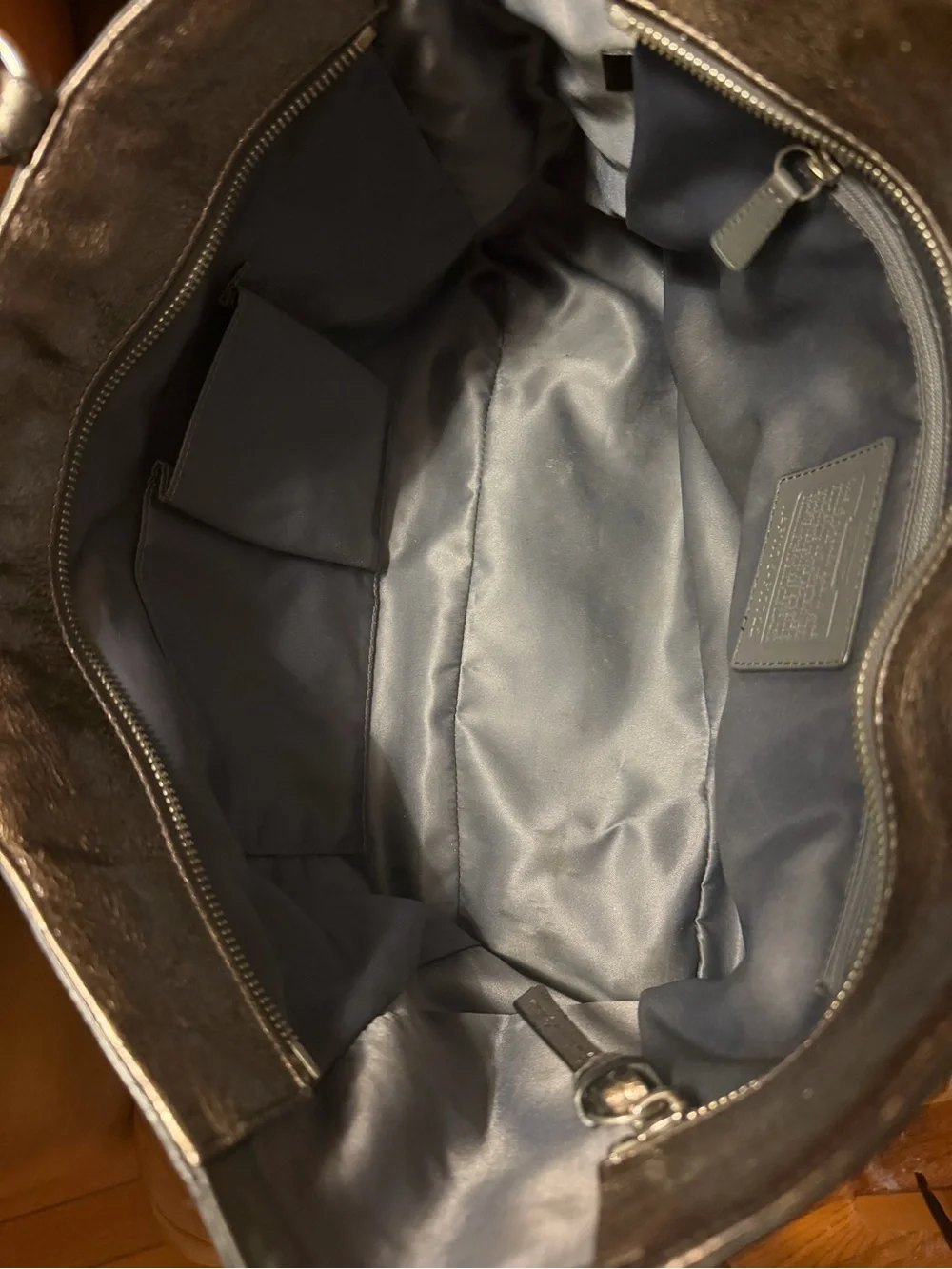 Coach embossed tote logo