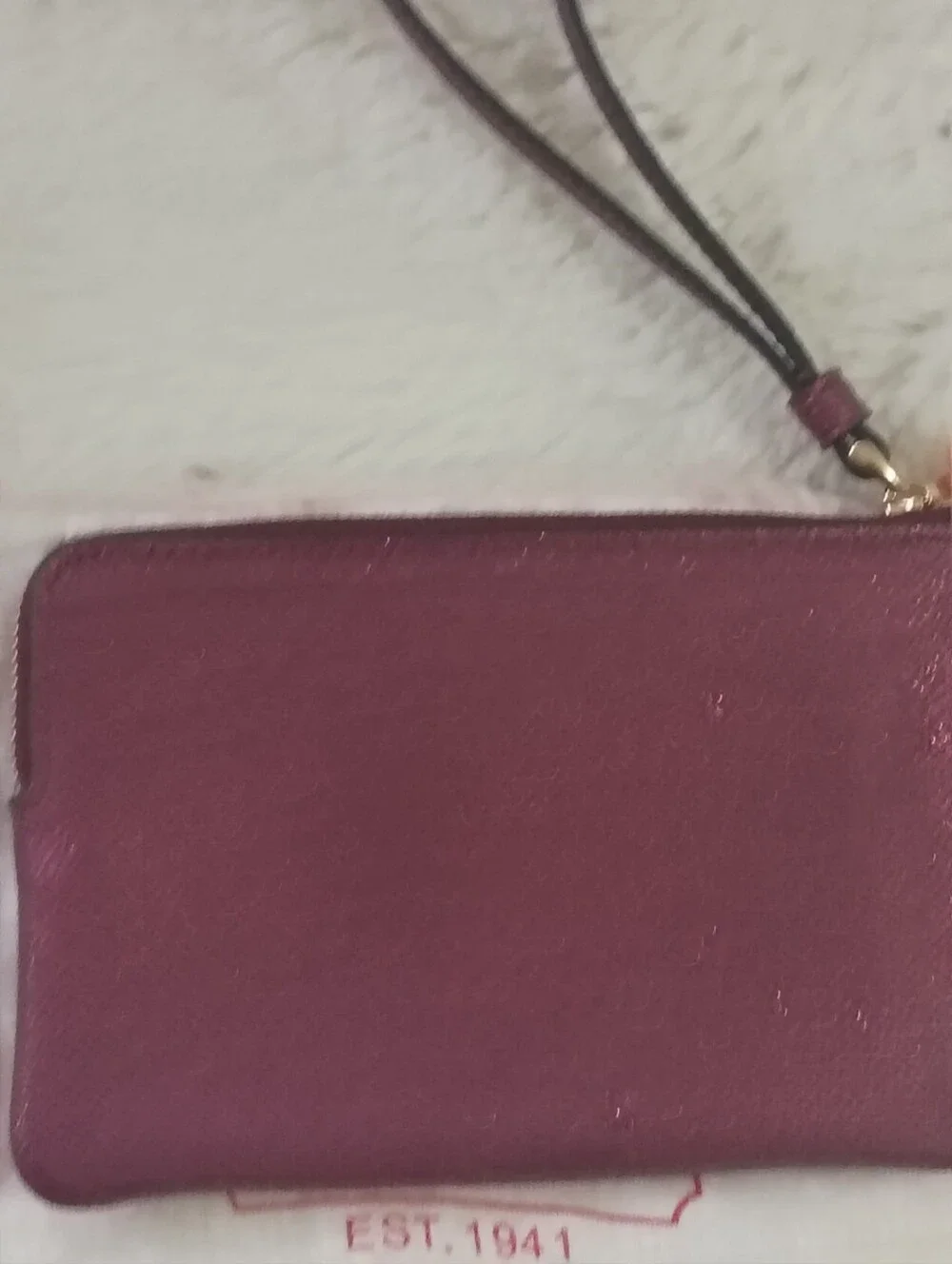 Coach no zip