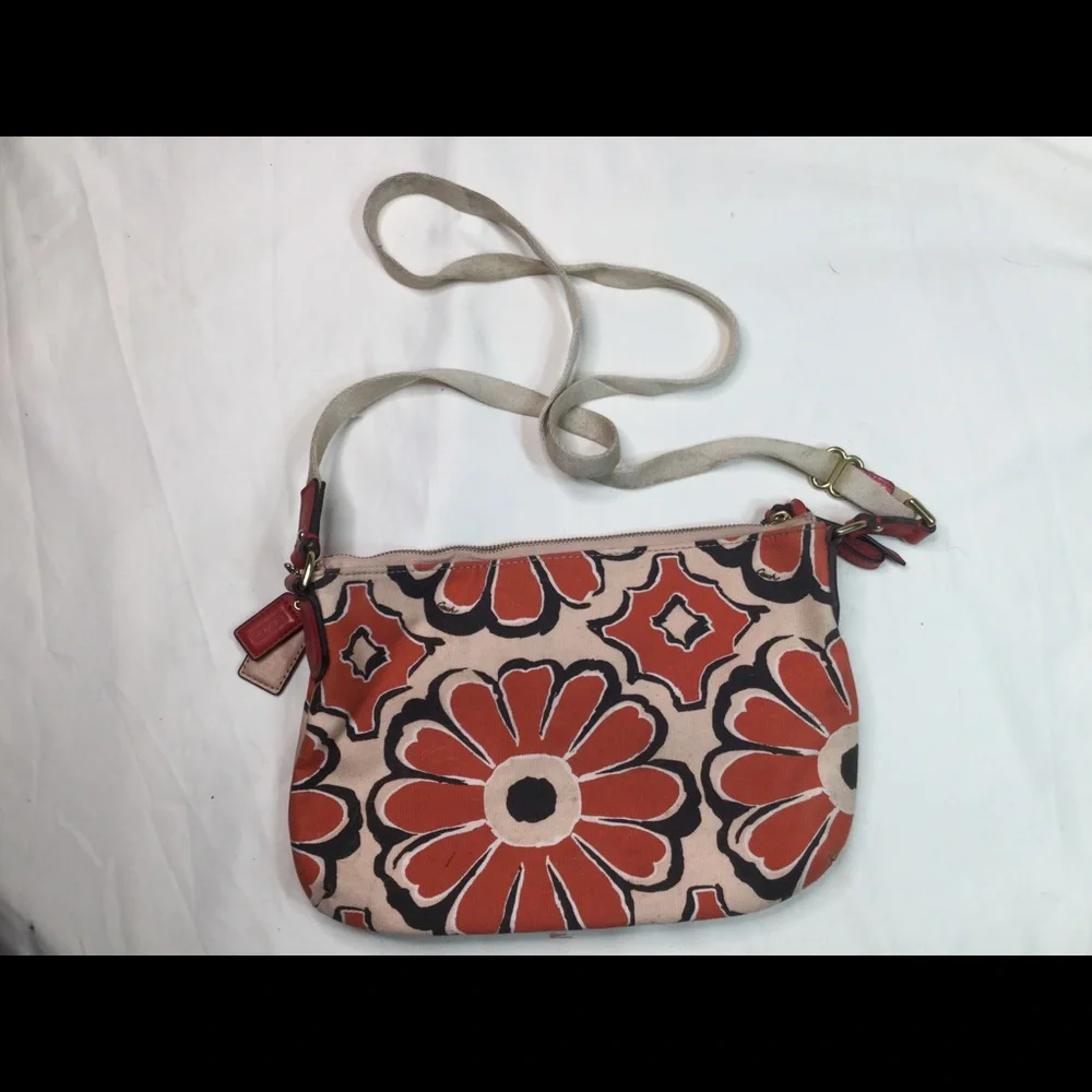 Coach strap east