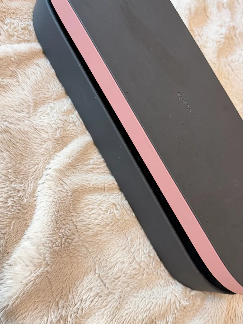 Dyson pink attached hair
