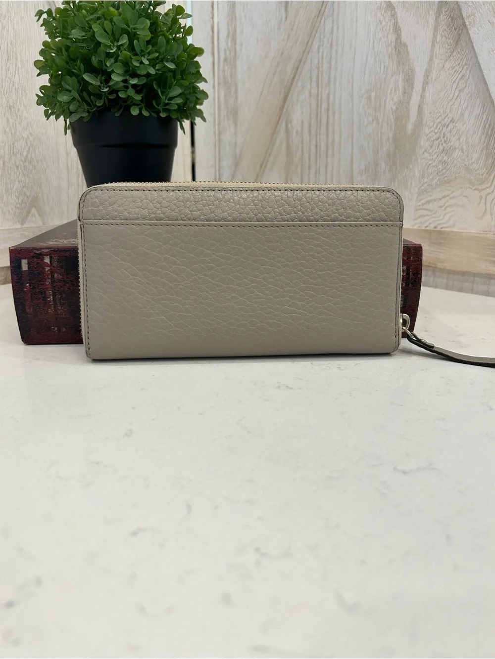 kate spade logo taupe