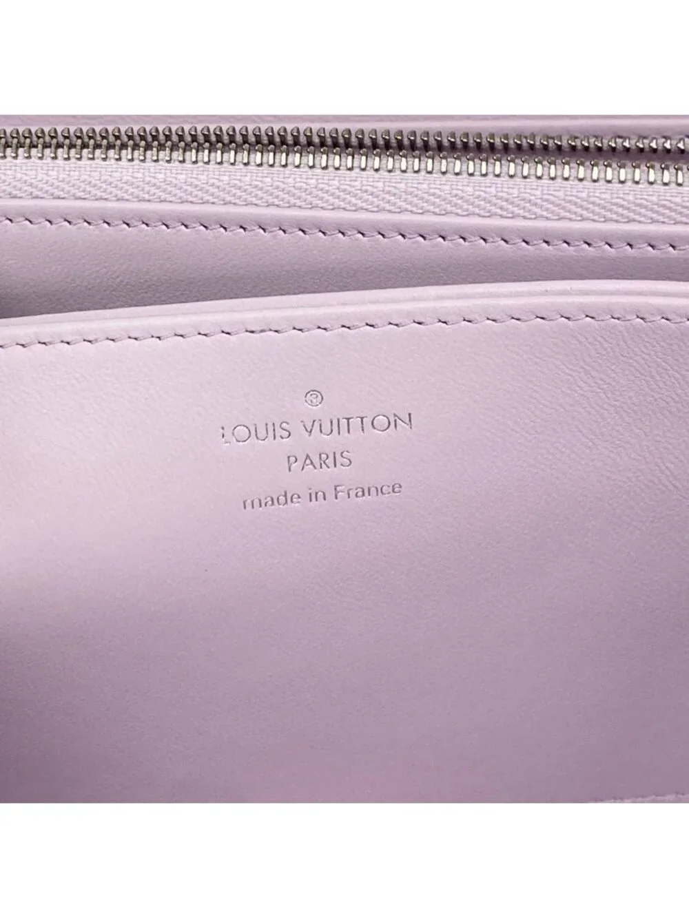 Louis Vuitton perforated zip are