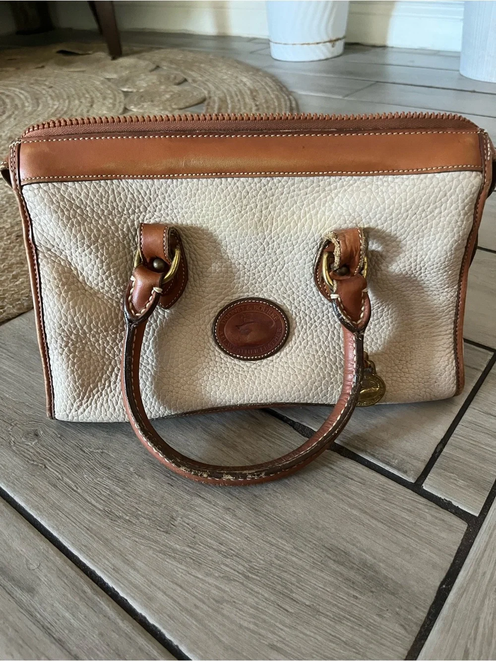 Dooney & Bourke pebbled cream