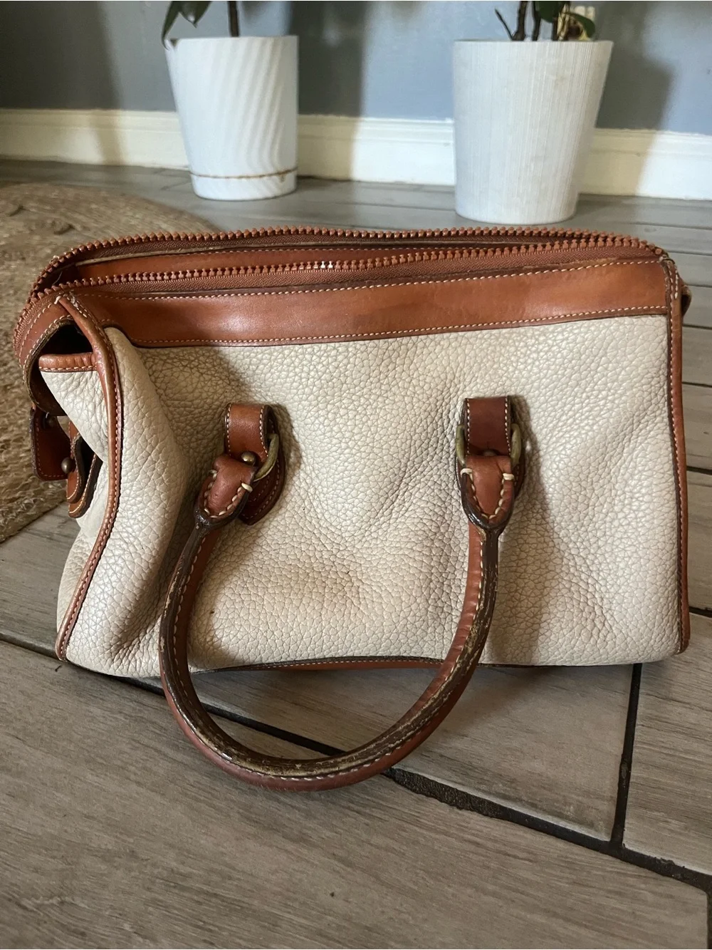 Dooney & Bourke pebbled cream