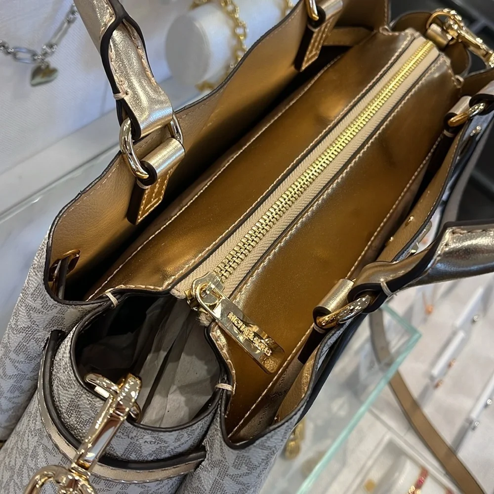 MICHAEL KORS  Reed Large Central Zip Graphic Logo Belted Satchel Pale Gold  NWT