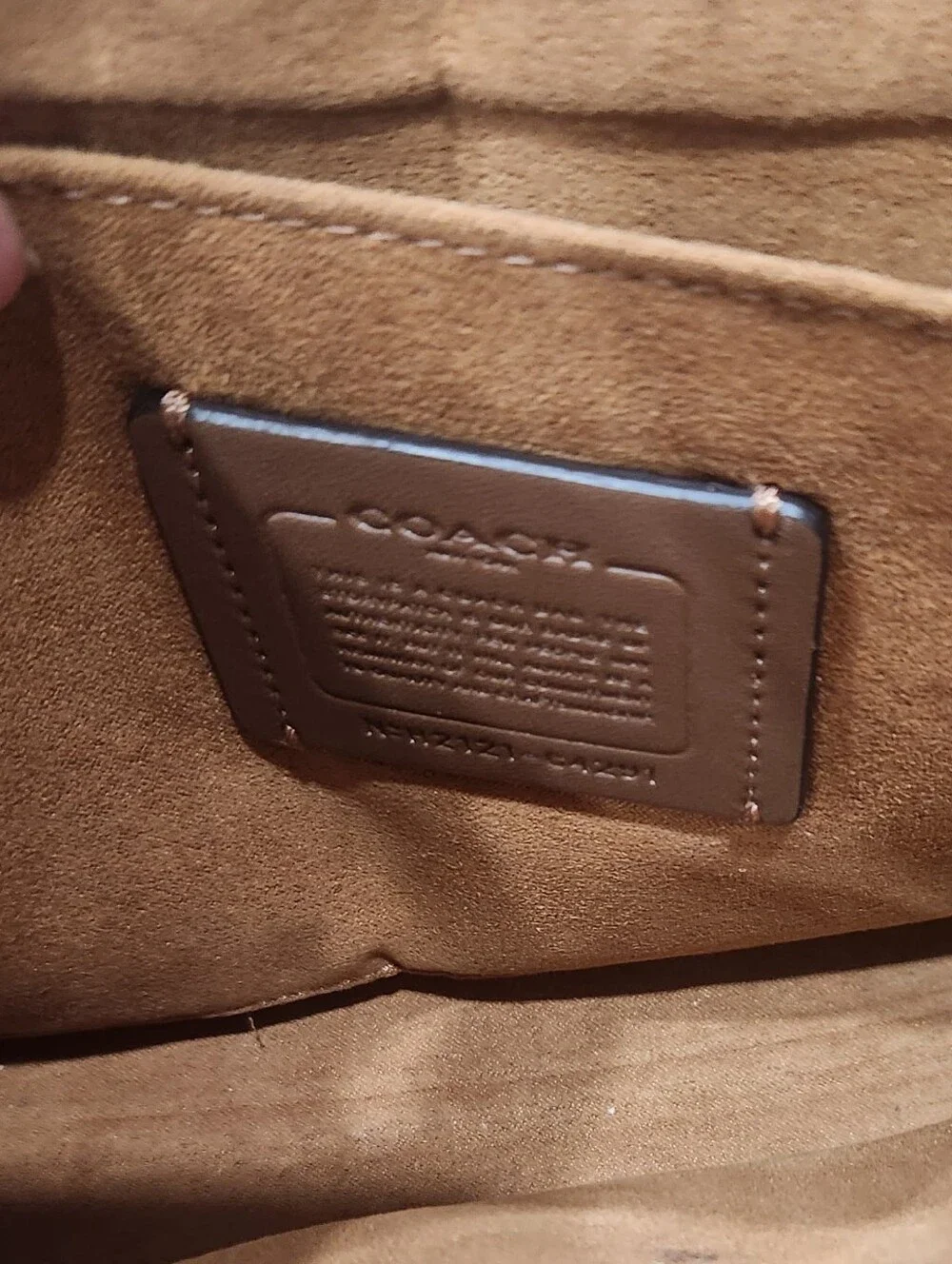 Coach elegant cream