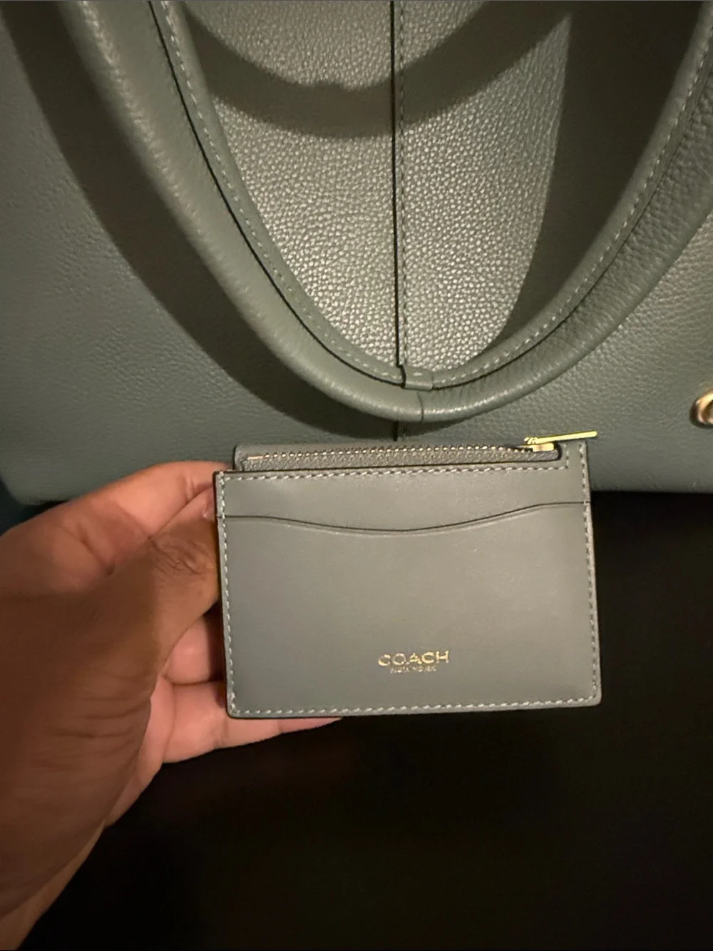 Coach sleek green