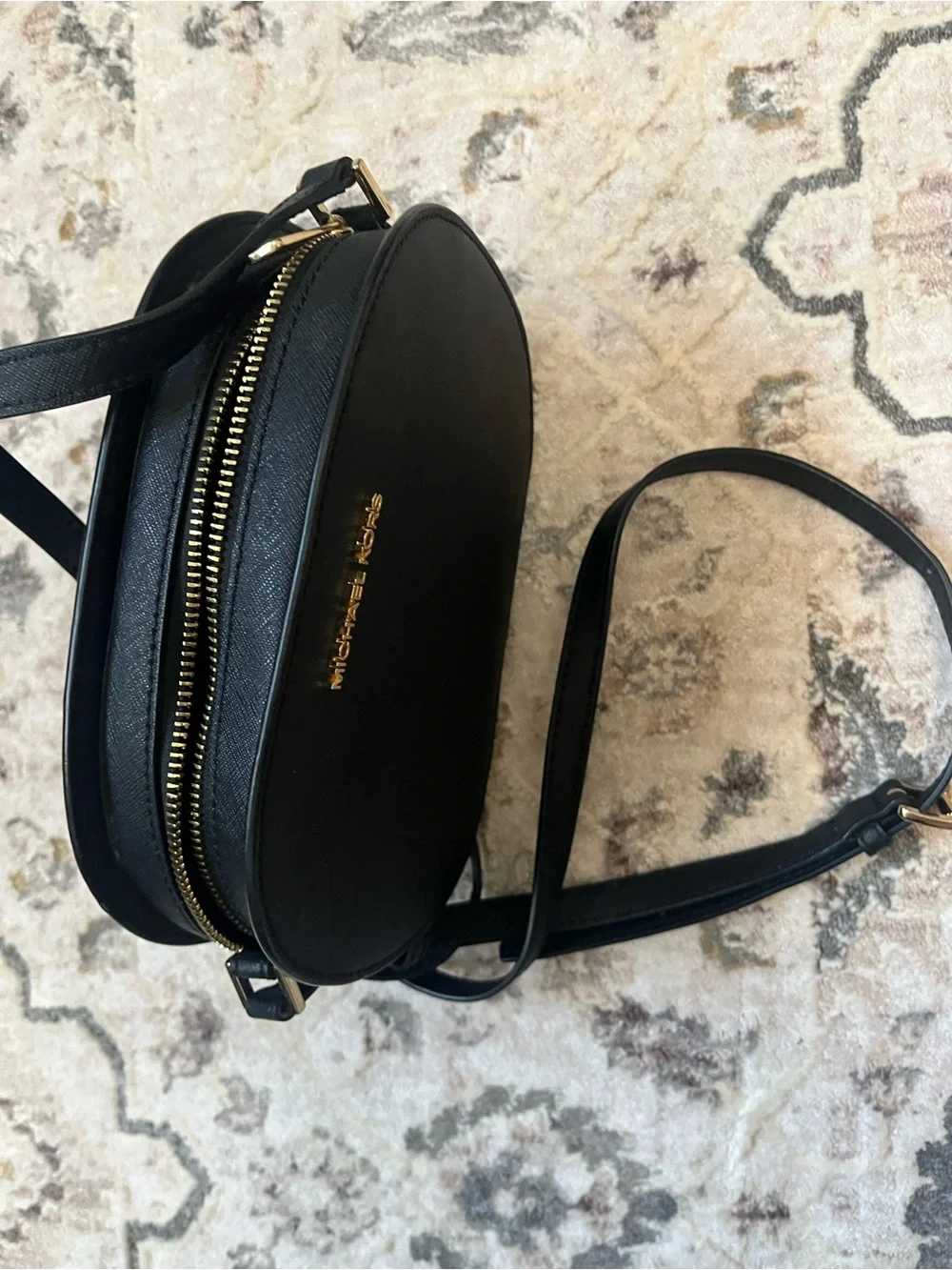 Michael Kors Black Oval Saffiano Crossbody with Gold Logo