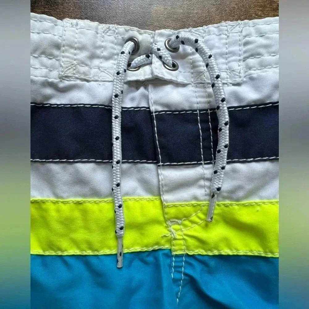 SET: Baby boy, Carter’s swim trunks + jumping beans. Size: 12M​