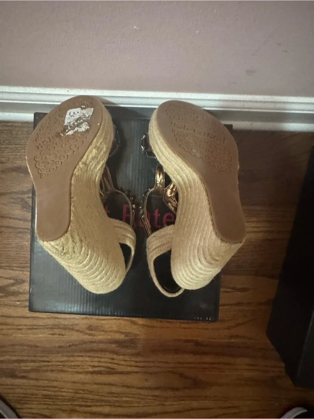 Not Rated gold wedge