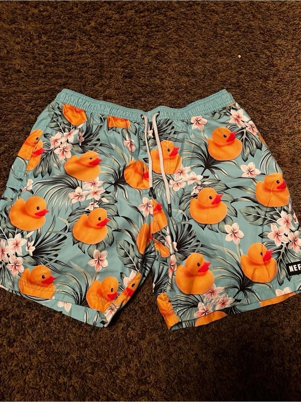 Neff Men’s Light Blue Swim Trunks with Orange Rubber Duck Print