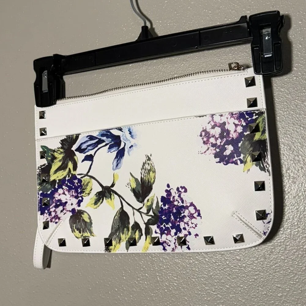 White House Black Market, floral and studded clutch.