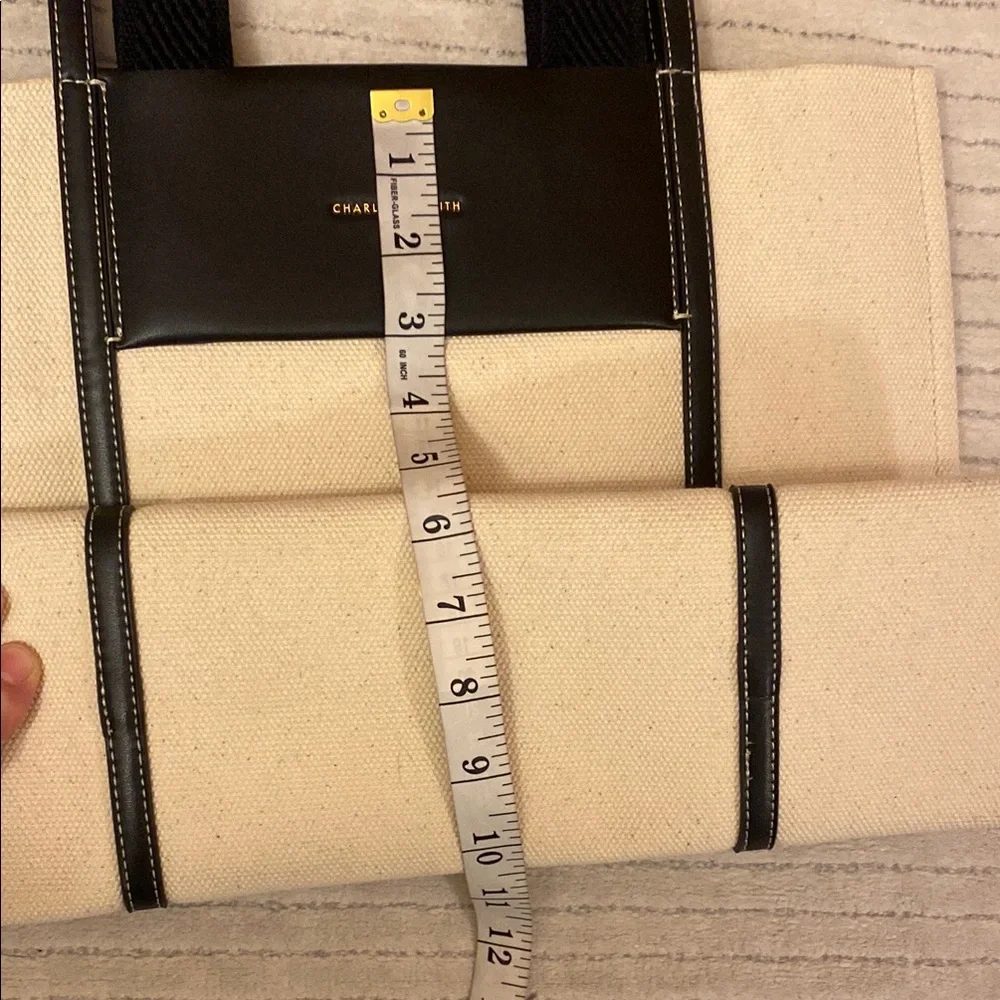 Charles & Keith handles clean trim