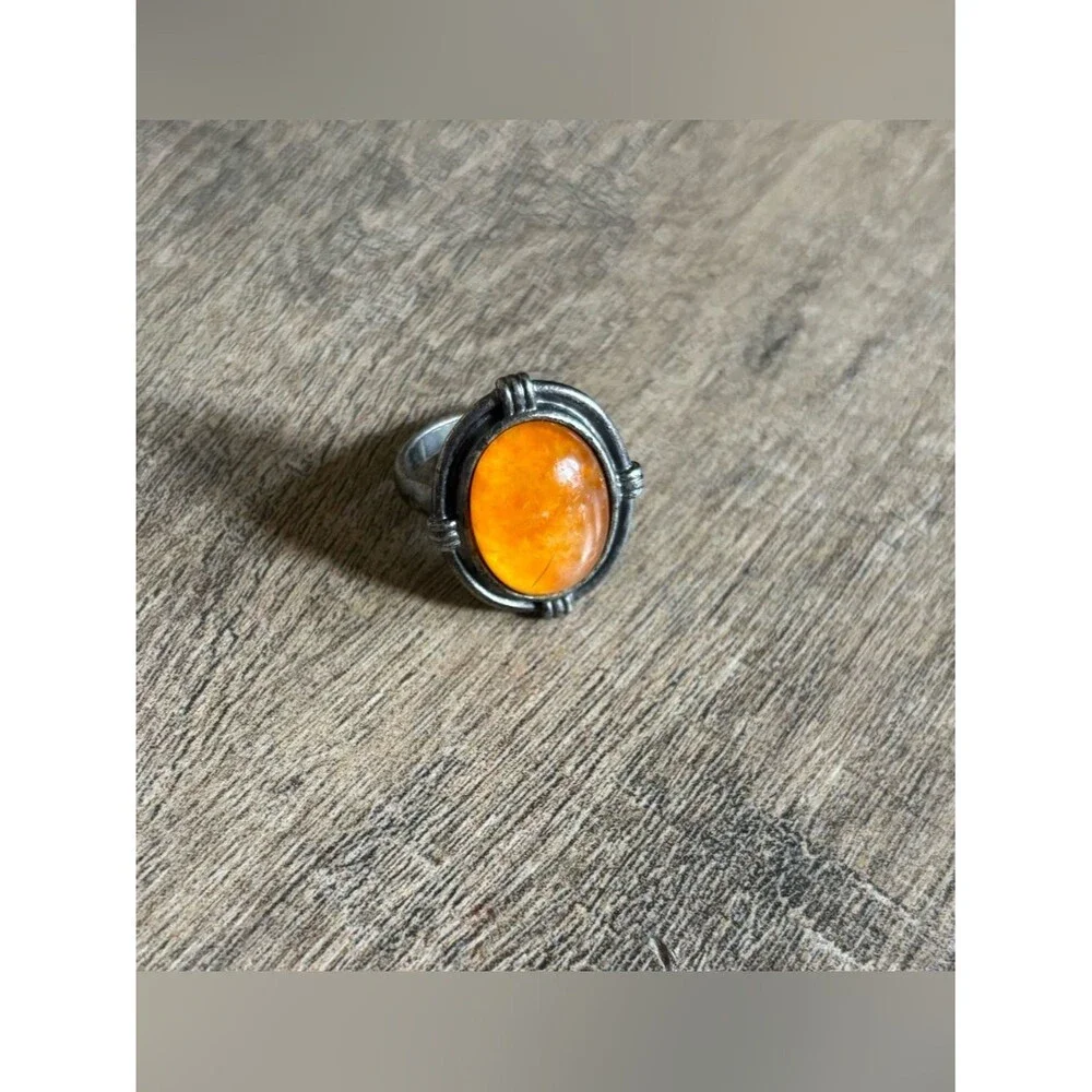 Untested women’s size 13.5 metal butterscotch amber or orange spiny oyster ring