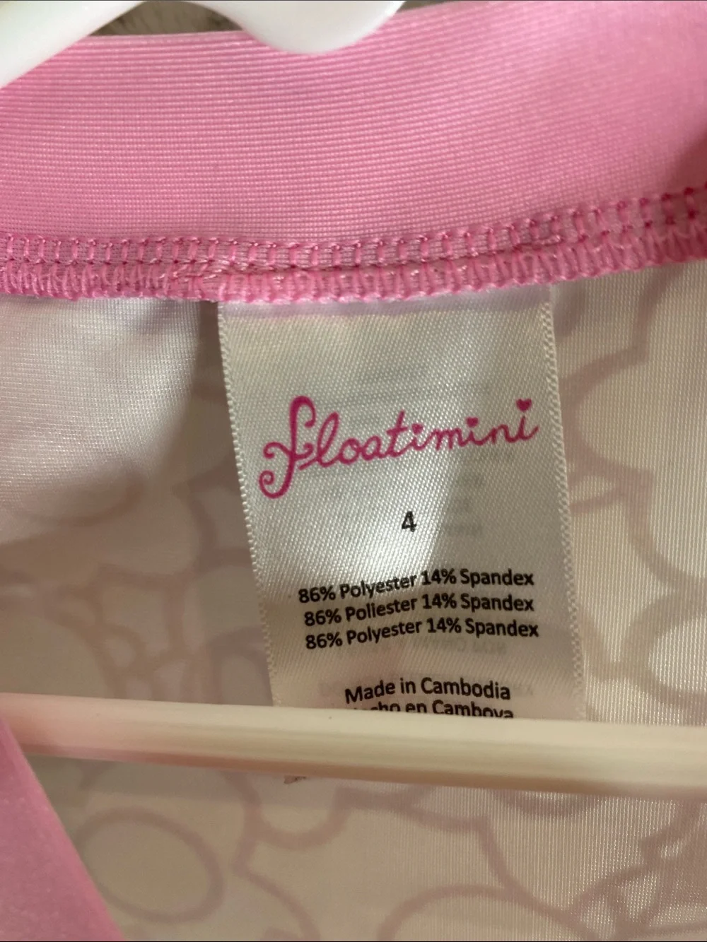 Floatimini White Short Sleeve Rashguard style swim top Pink Trim Floral Print