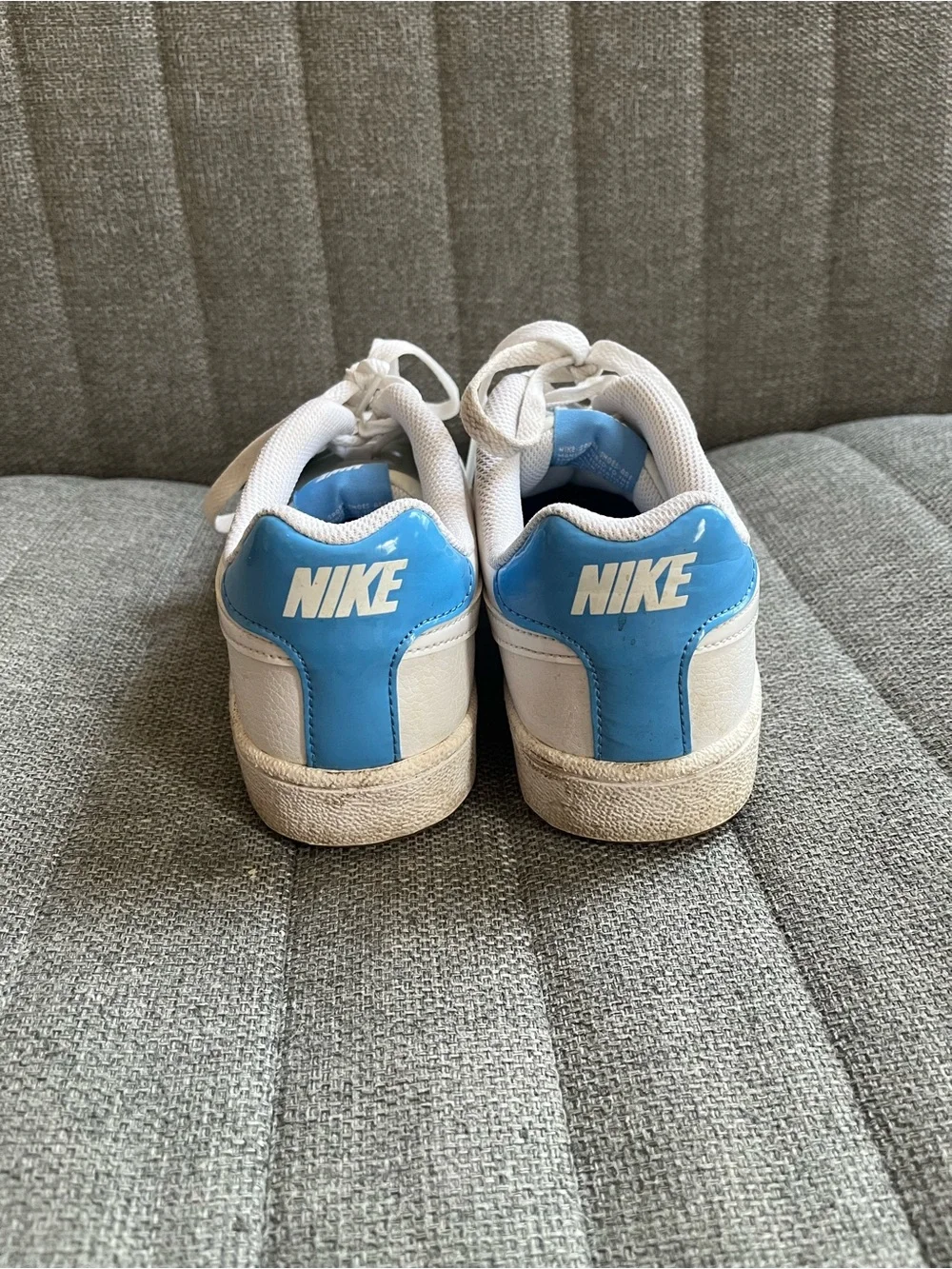 Nike Women’s White Sneakers with Light Blue Heel Tab