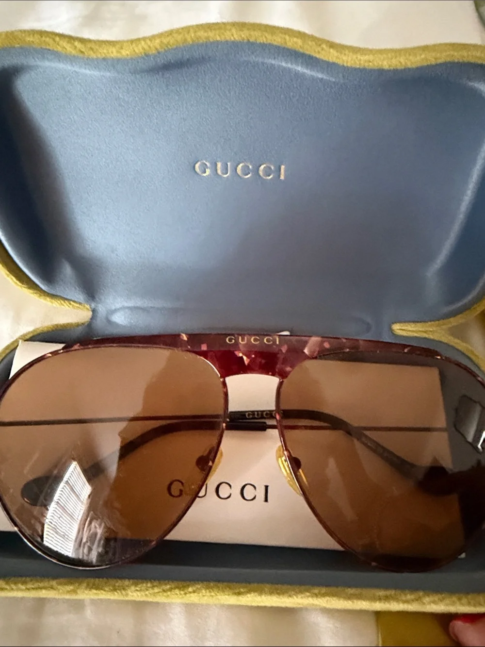 Gucci sunglasses translucent