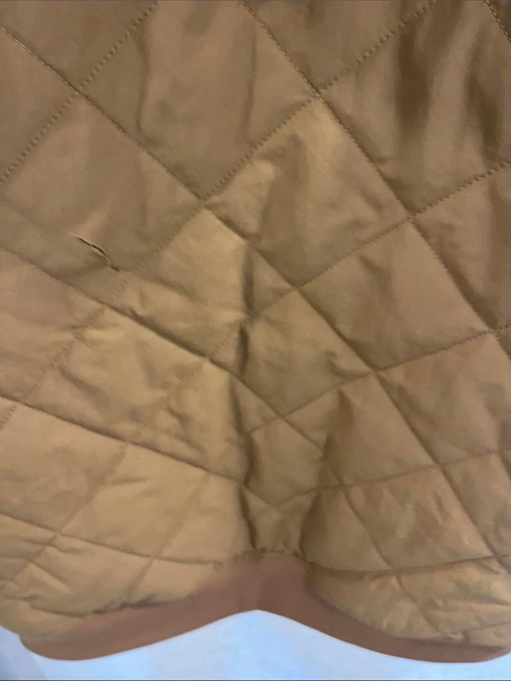 The North Face Quilted Sherpa-Lined Jacket in Camel