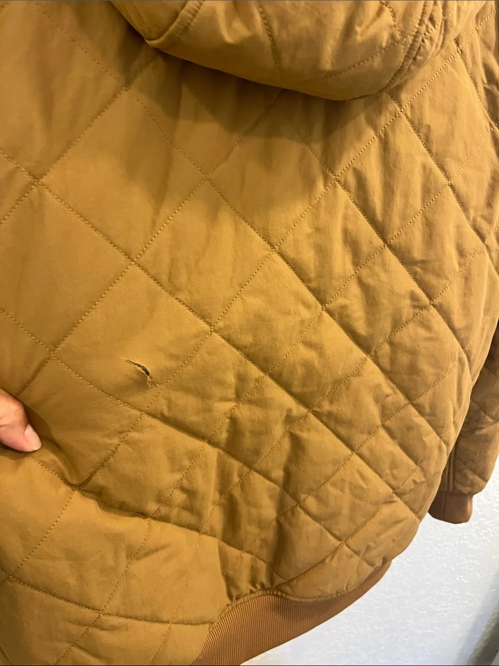 The North Face Quilted Sherpa-Lined Jacket in Camel