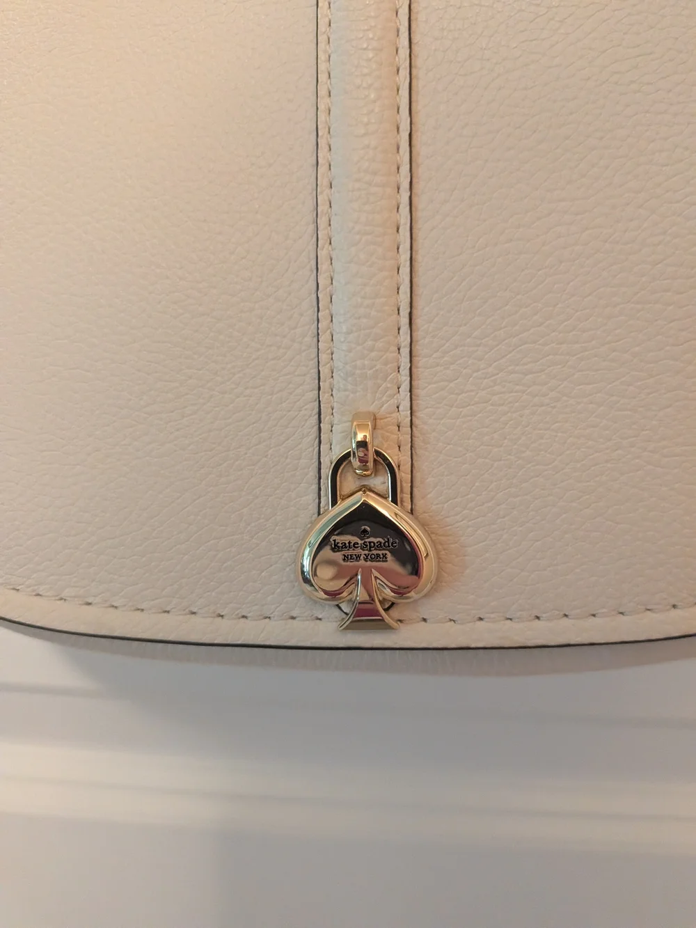 kate spade cream pebbled
