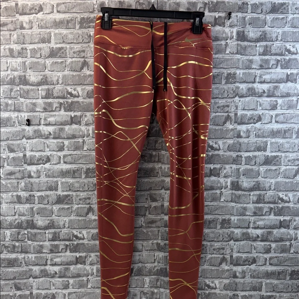 Nike running Copper and Gold Patterned Leggings‎