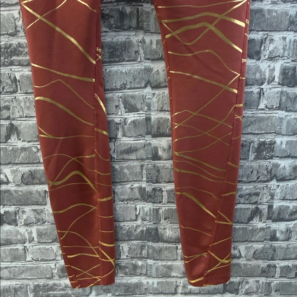Nike running Copper and Gold Patterned Leggings‎