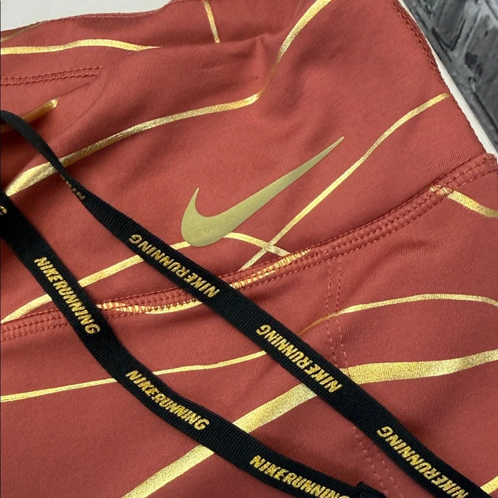 Nike running Copper and Gold Patterned Leggings‎
