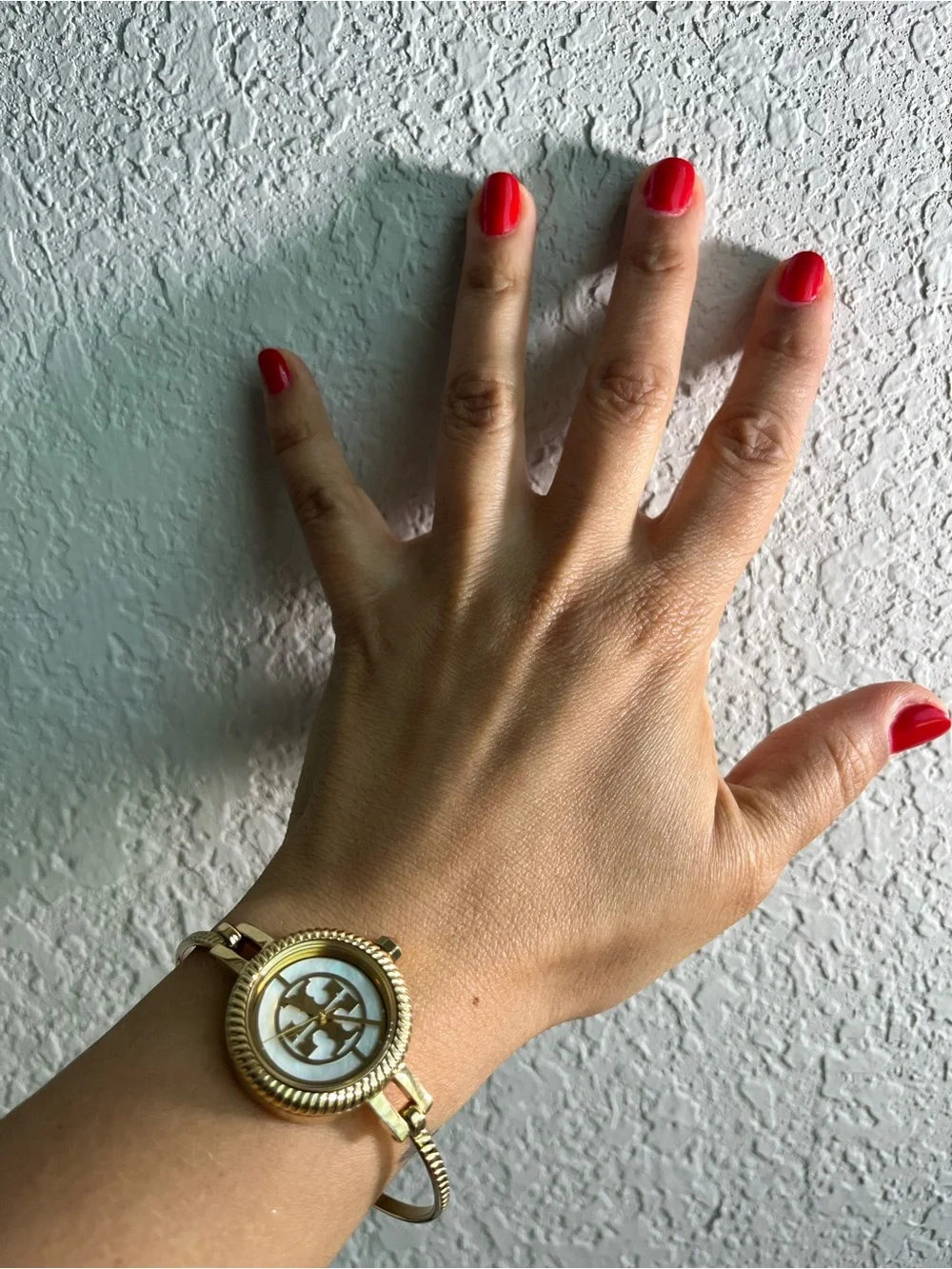 Tory Burch Reva TBW4029 ladies watch interchangeable rings.