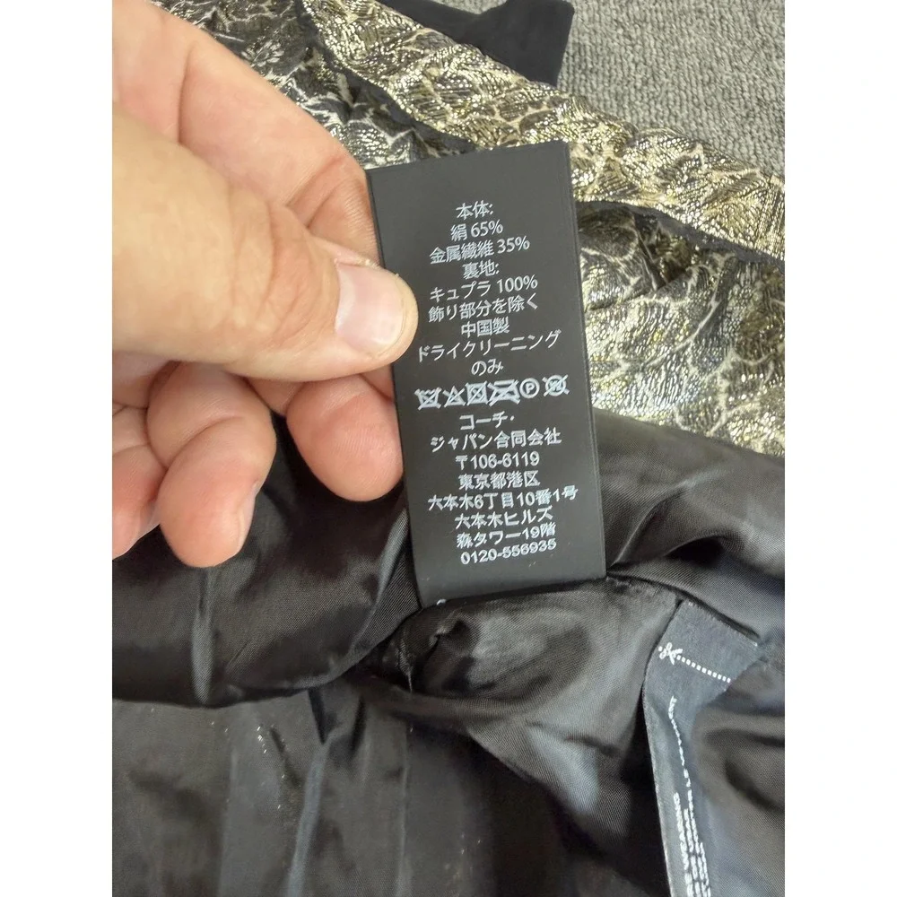 Coach 65% stored pleating