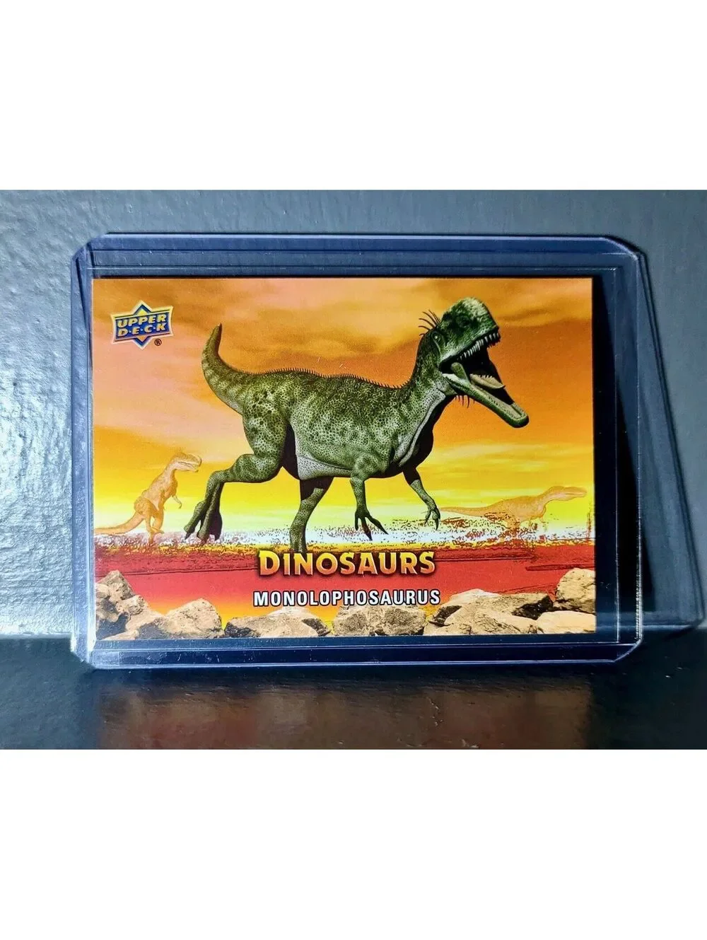 2015 Upper Deck Dinosaurs Monolophosaurus Extinction Red Parallel #65 Card