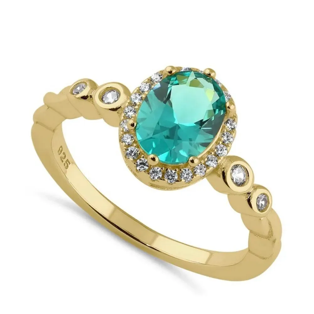 Sterling Elegance: Teal Halo Ring in Gold Vermeil with Side Stone Detailing