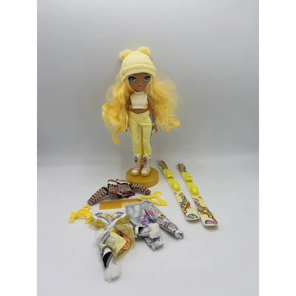 Rainbow High Winter Break Sunny Madison Yellow Fashion Doll Complete with Skis
