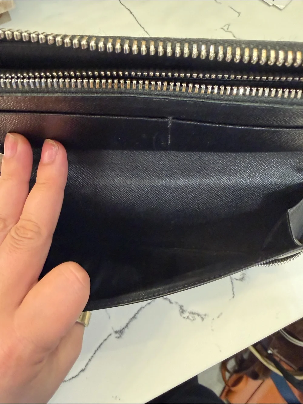 Louis Vuitton sleek zip