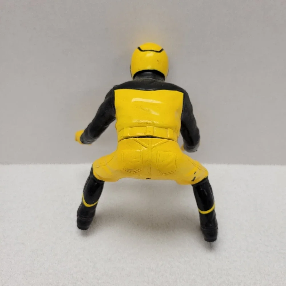 N/A figure yellow vintage