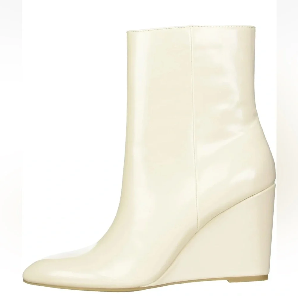 NWOT Dolce Vita Pascal ivory wedge heeled booties Size 7.5
