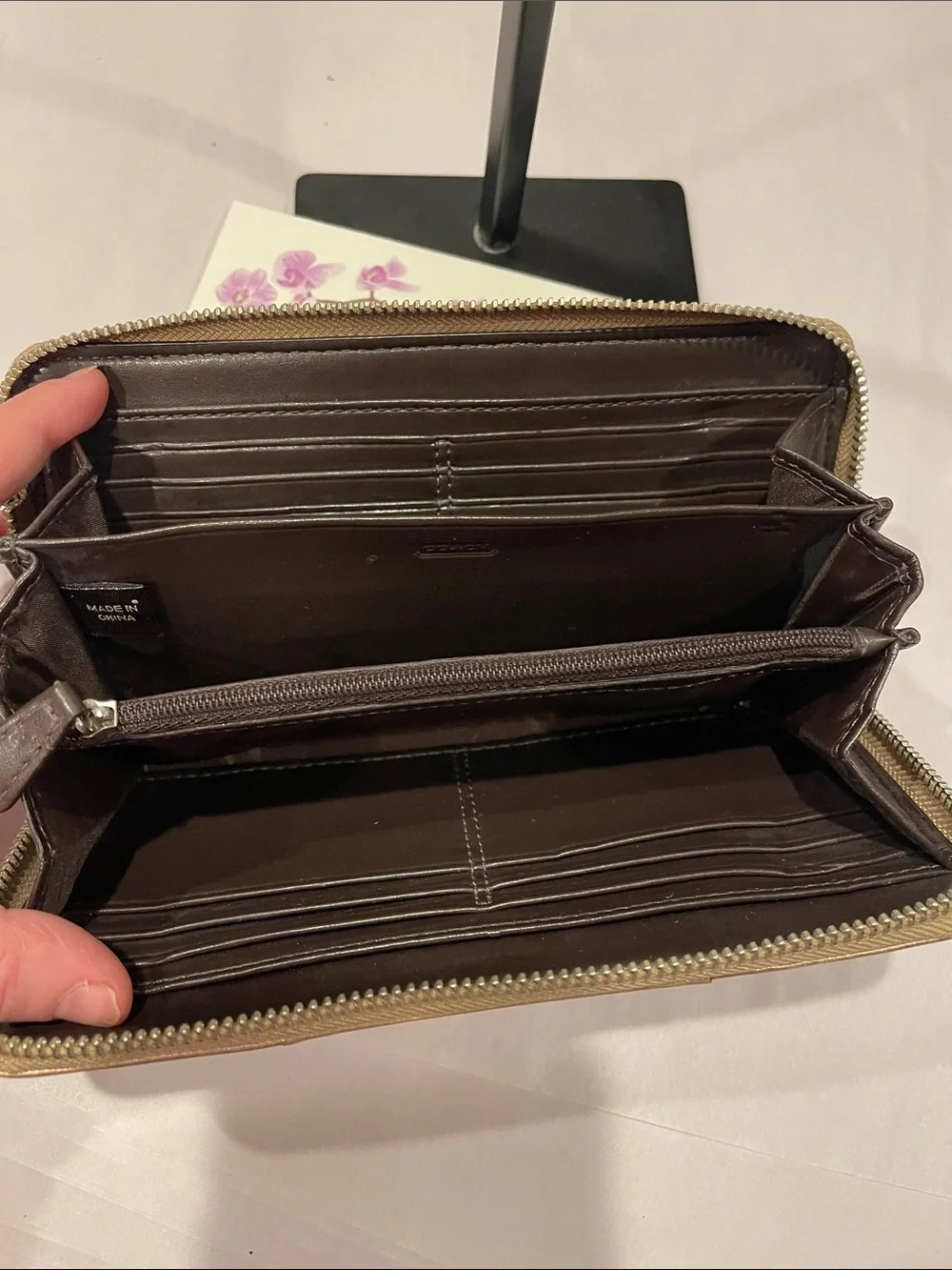 Coach sleek zip