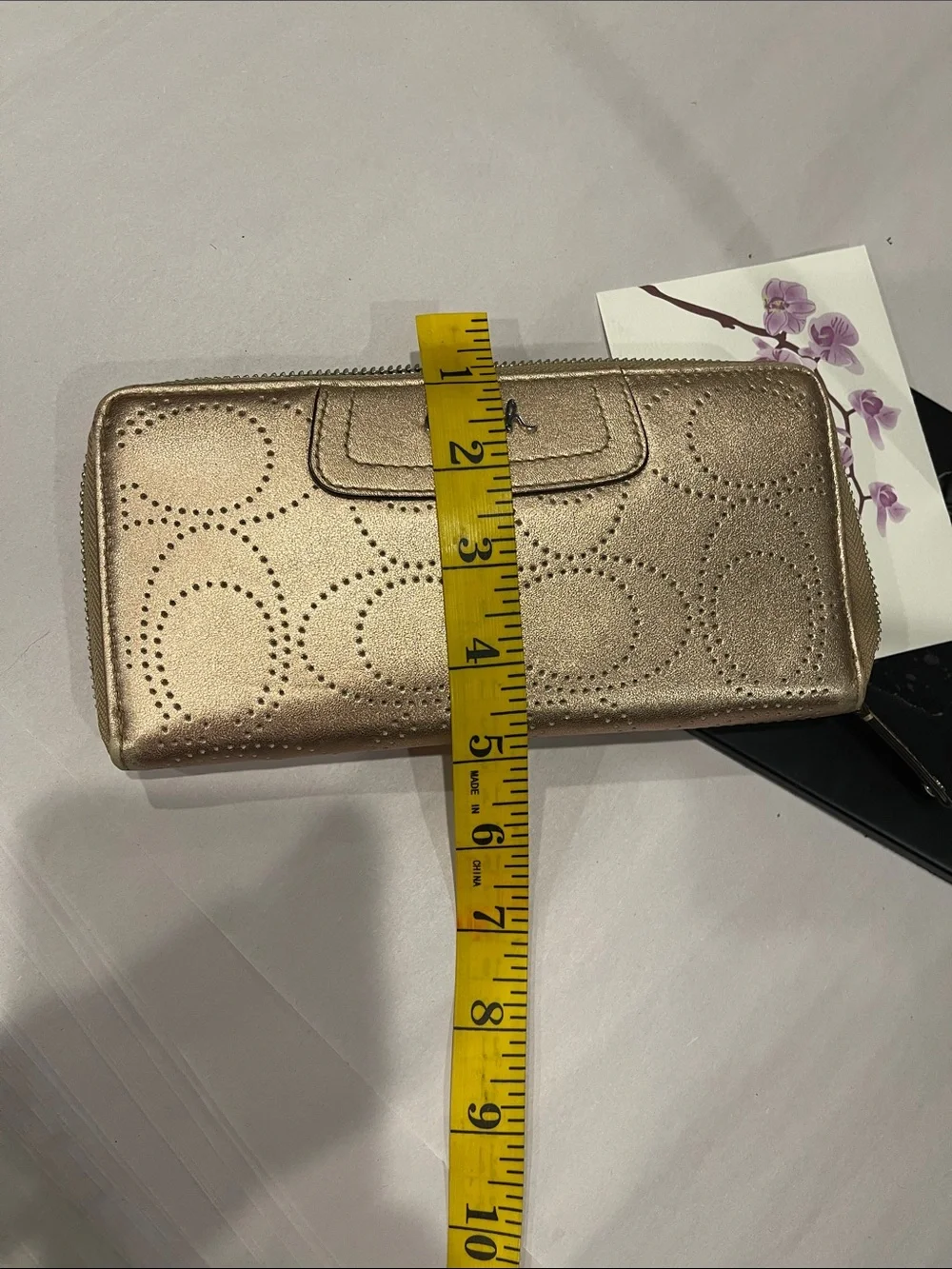 Coach sleek zip
