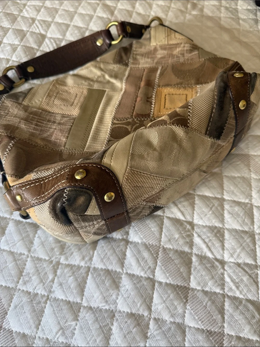 Coach shoulder wear by