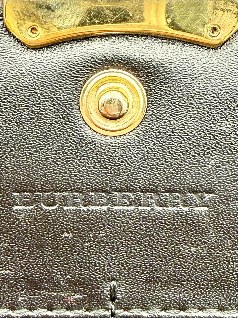 Burberry embossed pattern