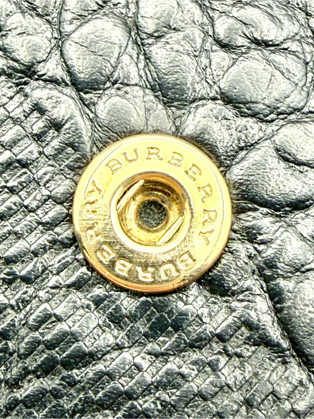 Burberry embossed pattern
